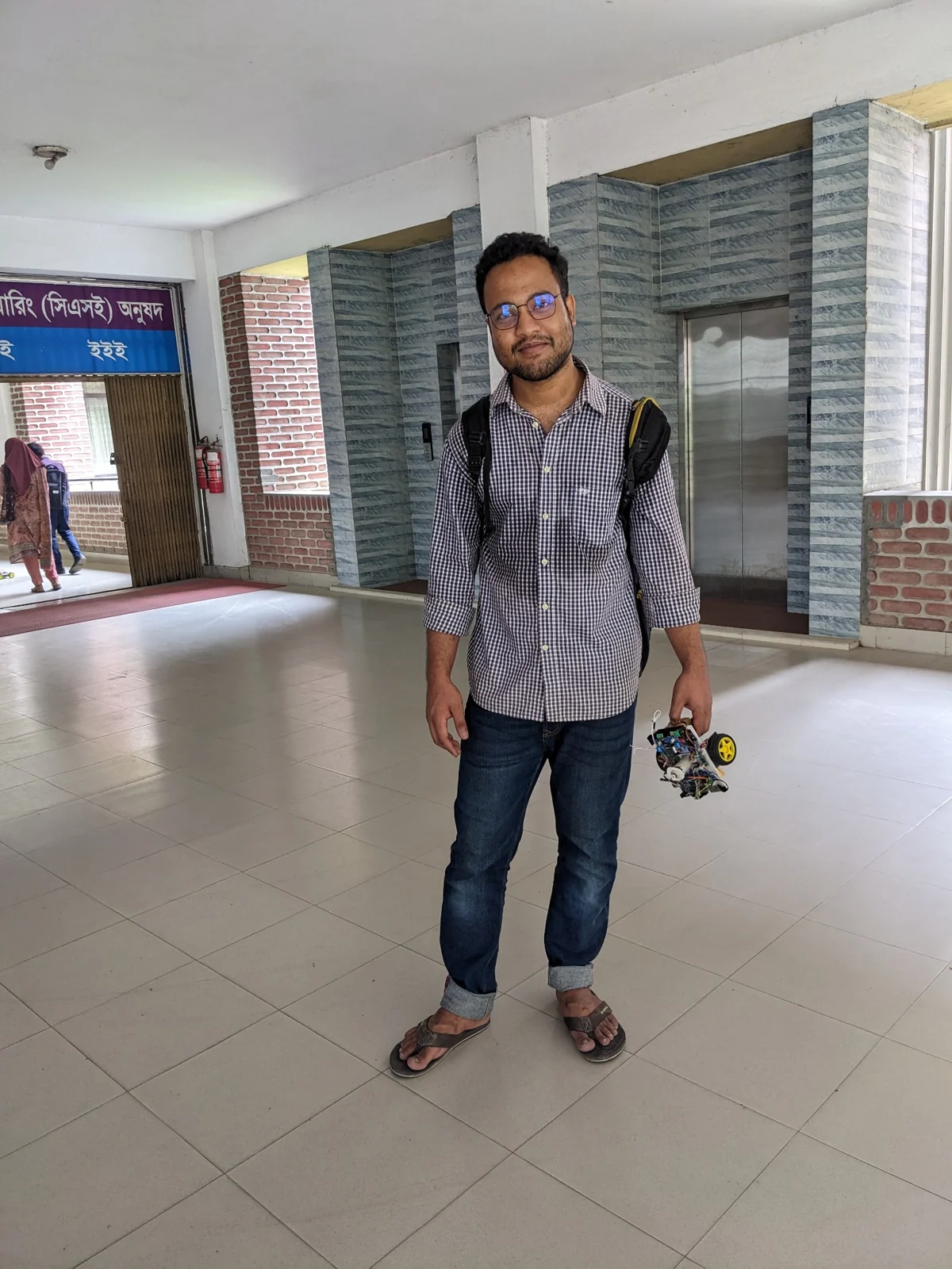 A campus moment with a small robot from the making archive.