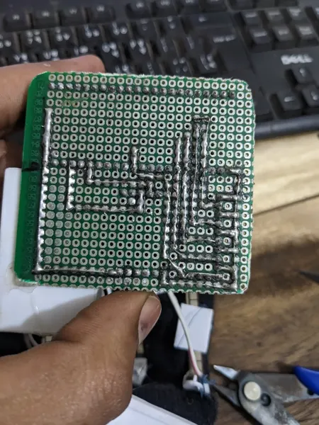 Hand-wired connections on an early prototype board.
