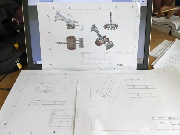 Drawings and model references used during manipulator development.