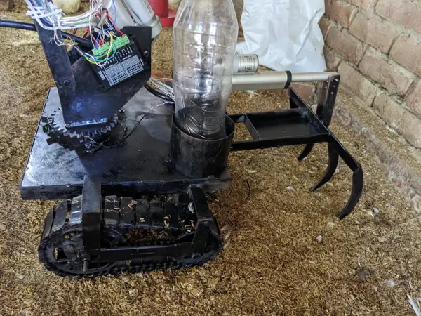 The mobile platform, plough and on-board equipment during farm work.