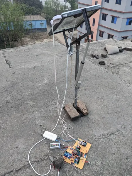 An actuated solar-panel prototype and its connected test electronics.