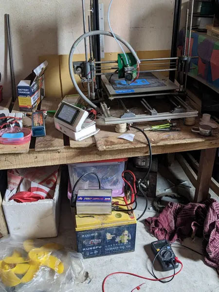Printer equipment among components in the room-based workspace.