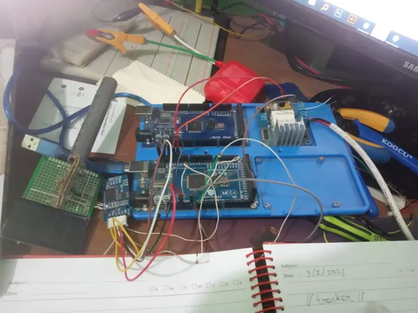 An earlier tracker-control experiment on the workbench.