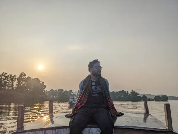 A river journey at sunset.
